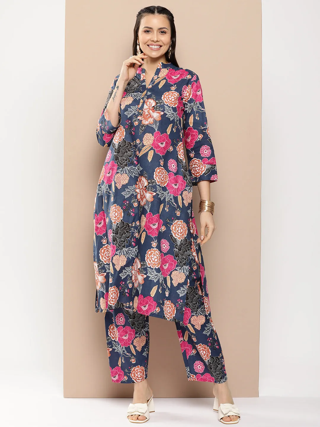Blue Floral Print Kurta With Blue Floral Print Trousers.