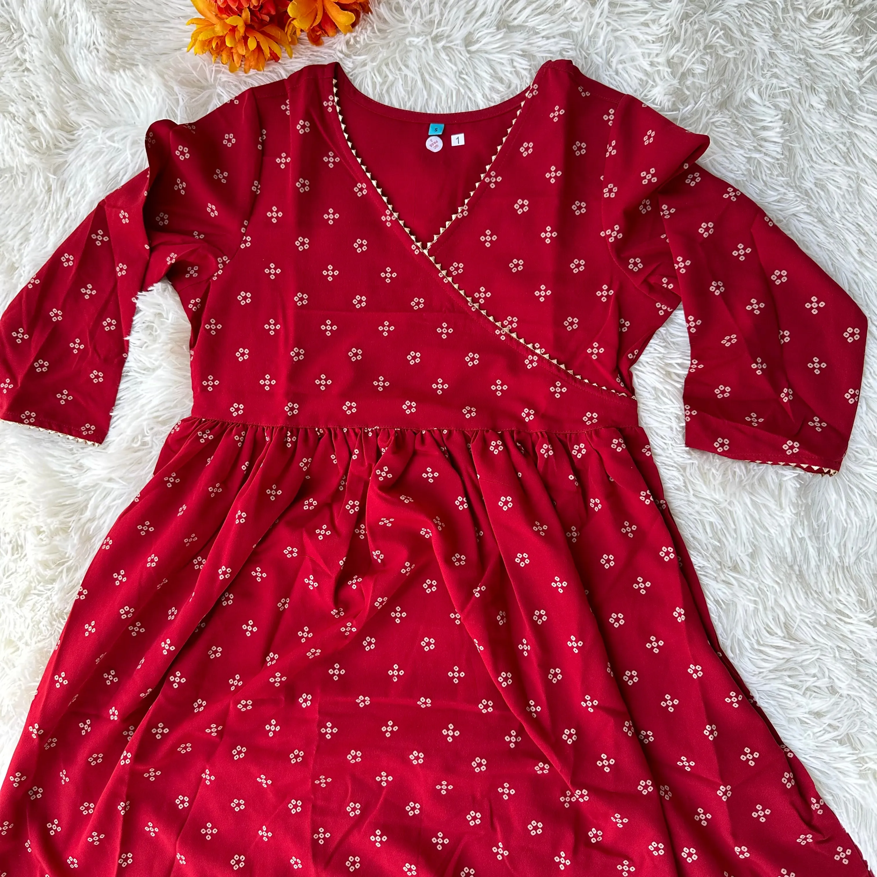 Feminine Flair: Maroon Crepe Bandhani Printed Flared Kurta with V-Neckline