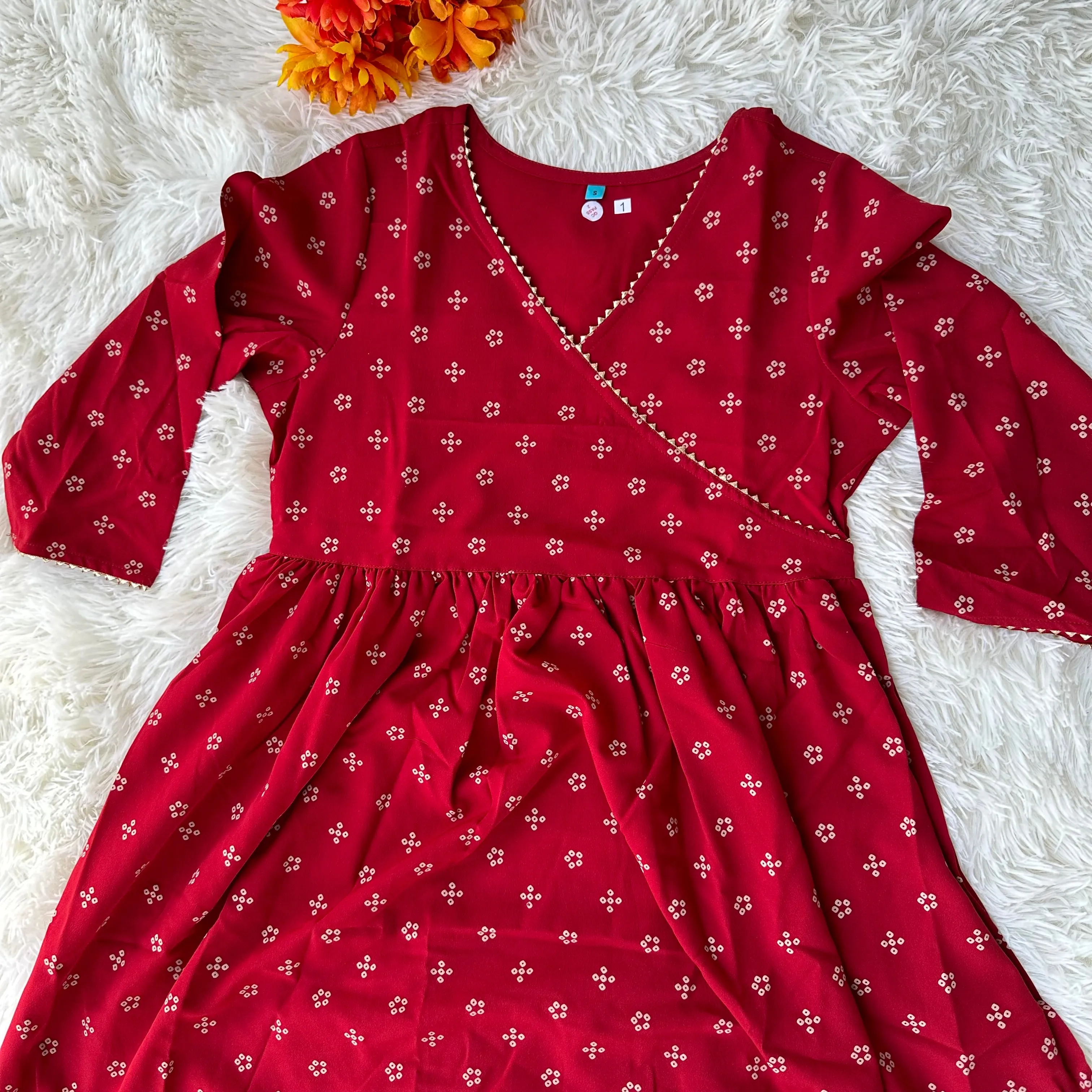 Feminine Flair: Maroon Crepe Bandhani Printed Flared Kurta with V-Neckline