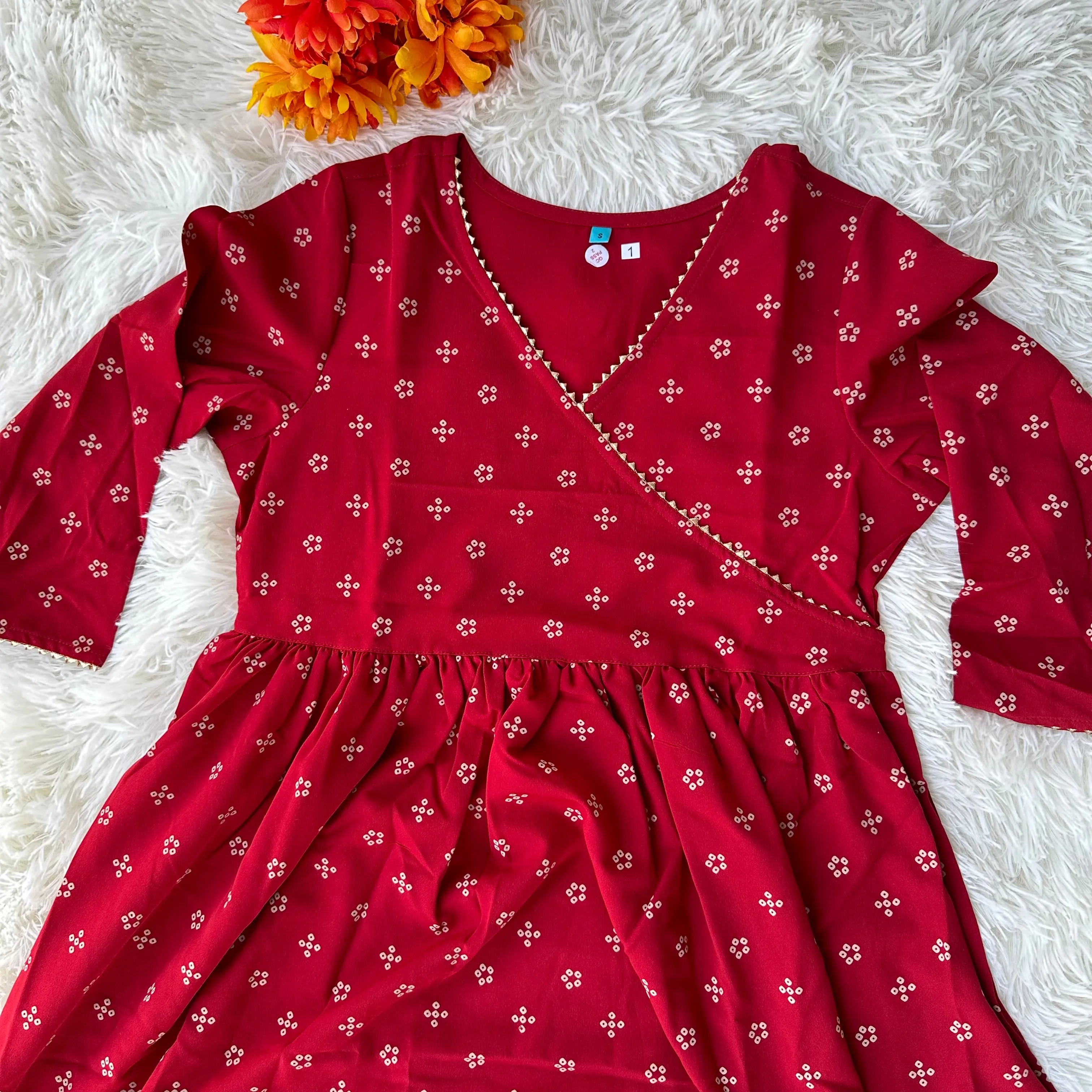 Feminine Flair: Maroon Crepe Bandhani Printed Flared Kurta with V-Neckline