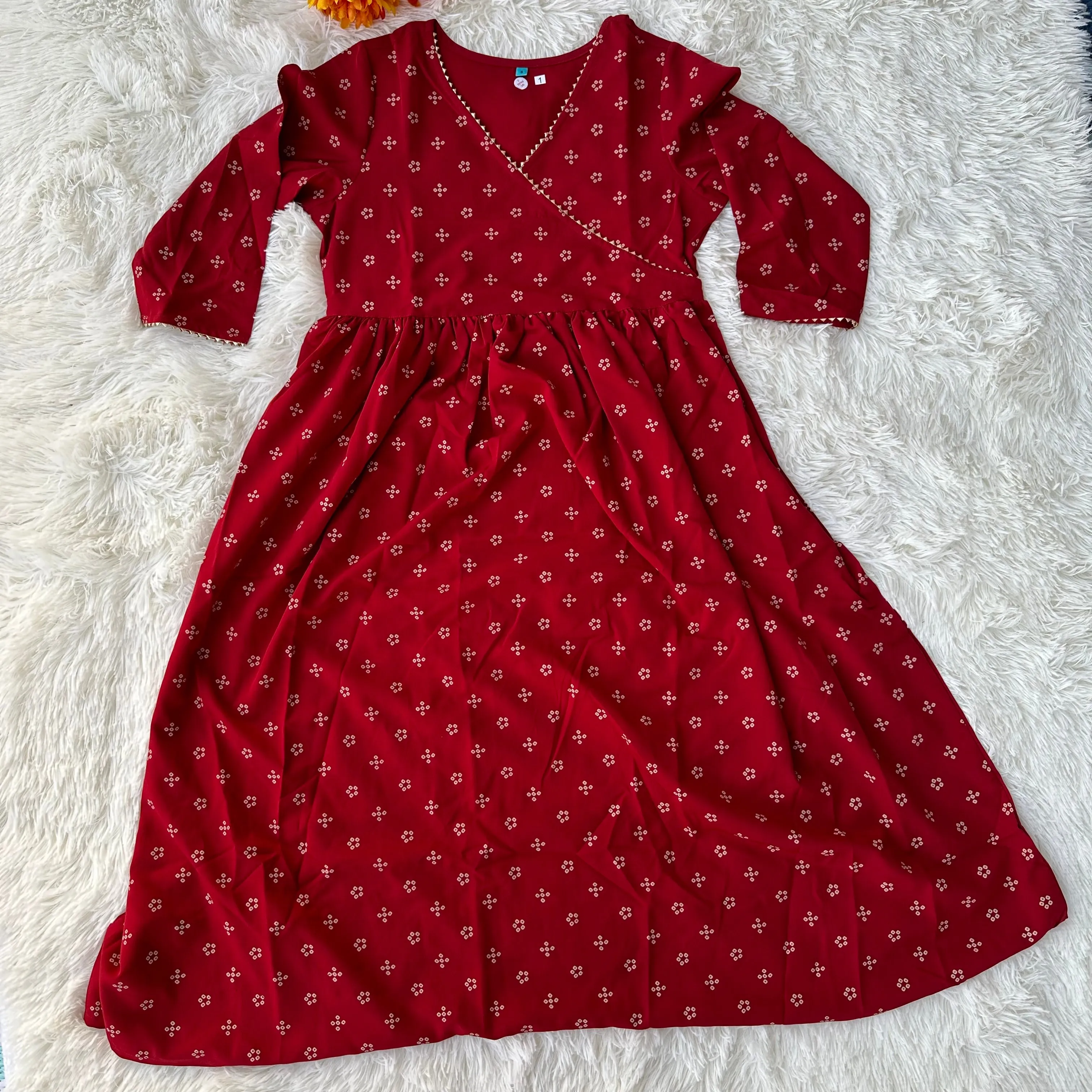 Feminine Flair: Maroon Crepe Bandhani Printed Flared Kurta with V-Neckline